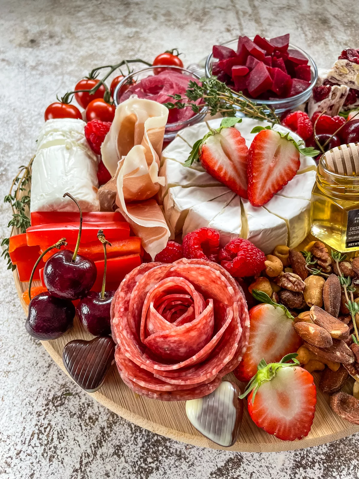 A side view of a Valentine's Day charcuterie board