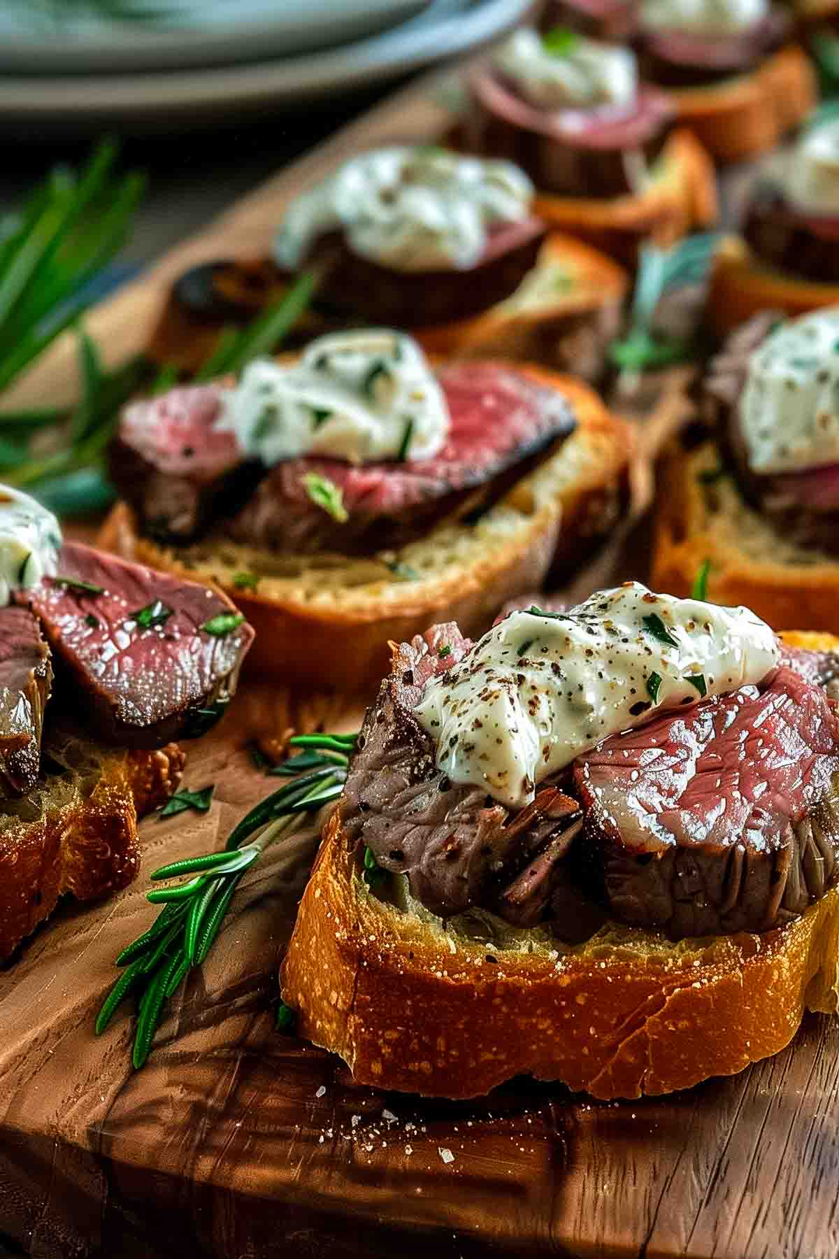 Steak crostini with horseradish sauce as an example of charcuterie for dinner