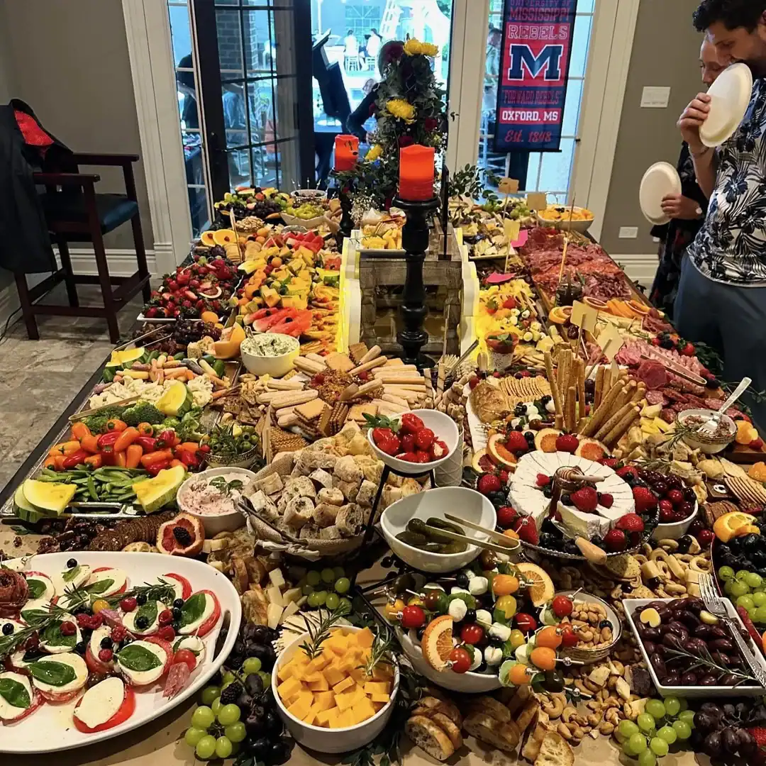 a large grazing table for a graduation party